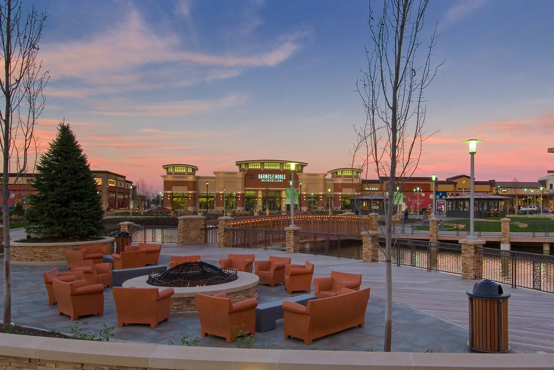 Public-facing commercial terrace at dusk